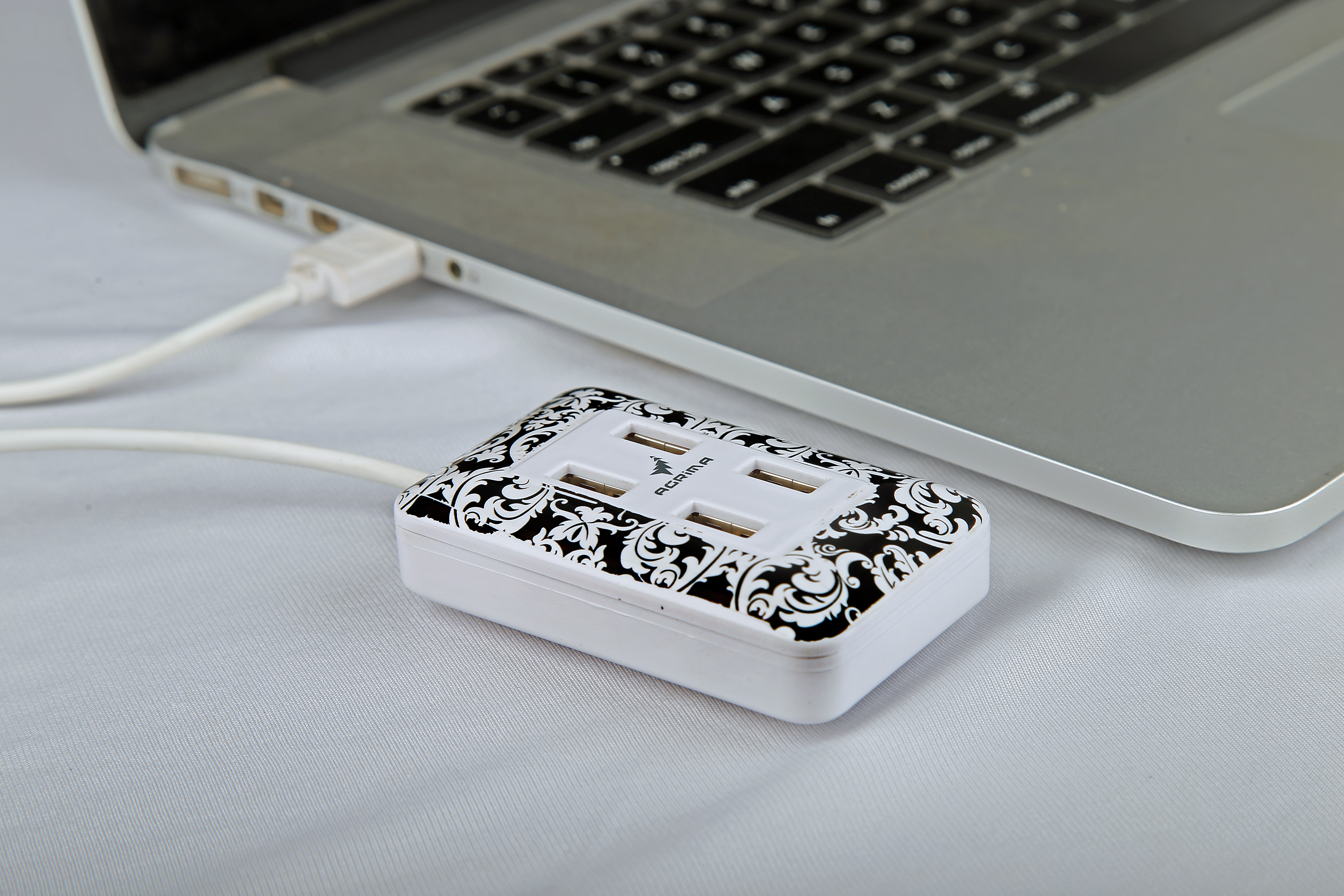 Image of a USB hub plugged into a laptop